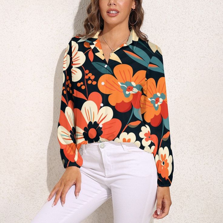 Immerse yourself in the timeless allure of the '70s with our Vintage-inspired Black Orange Floral Blouse, a stunning piece that captures the essence of the era. Embrace the free-spirited vibes with our 70s Style Blouse, perfect for the modern woman who appreciates the classic charm of '70s Clothing. This Boho Style Top is an inspired choice, featuring a bold and beautiful large floral pattern print in orange, beige, and black, making it a versatile and eye-catching addition to your wardrobe.Indulge in the whimsical elegance of this semi-sheer top, adorned with long balloon sleeves and elastic cuffs, adding a touch of grace and playfulness to your ensemble. Whether it's a casual evening or a formal event, this Floral Top seamlessly transitions between occasions, offering a perfect blend of Spring Multicolor Blouse With Collared Neckline, Multicolor Floral Print Top With Collared Neckline, Chic Tops With Floral Print And Collared Neckline, Vintage Printed V-neck Blouse, Chic Retro Print Tops For Summer, Spring Printed Top With Collared Neckline, Spring Printed Tops With Collared Neckline, Spring Collared Neckline Printed Tops, Spring Casual Blouse With Retro Print