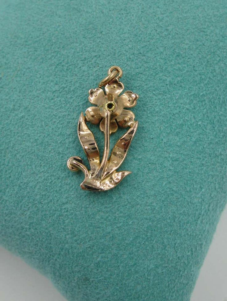 For Sale on 1stDibs - A stunning original Victorian - Belle Epoque Pendant in the form of a flower set with a gorgeous Old Mine Cut Diamond in the center with pearl set petals Antique Gold Flower Jewelry, Elegant Flower Pendant Brooch Jewelry, Elegant Flower Pendant Brooch, Formal Flower Shaped Hallmarked Brooch, Fine Jewelry Flower Brooch, Vintage Flower Shaped Wedding Jewelry, Vintage Flower Shape Wedding Jewelry, Flower Pendant Brooch For Wedding, Flower-shaped Wedding Brooch