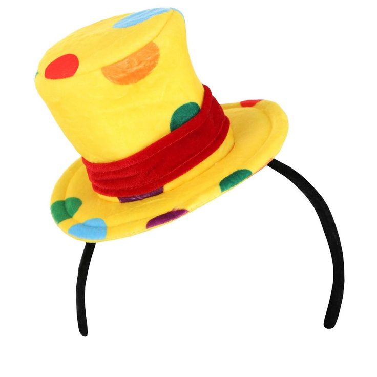 Get ready to bring your costume game to the next level with our Mini Yellow Clown Top Hat for Adults! This vibrant and elegant accessory is designed to make you stand out in style at any event. The velour headband and foam backing ensure both comfort and durability, while the colorful polka dots add a playful touch to any outfit or costume. Easy to wear with its velour fabric-covered headband that effortlessly slides through elastic loops on the hat, this mini top hat is perfect for hassle-free Top Hat Halloween Costume, Hat Halloween Costume, Clown Suit, California Costumes, Mini Top Hat, Halloween Costume Shop, Blue Yellow Red, Clown Costume, Halloween Costume Accessories