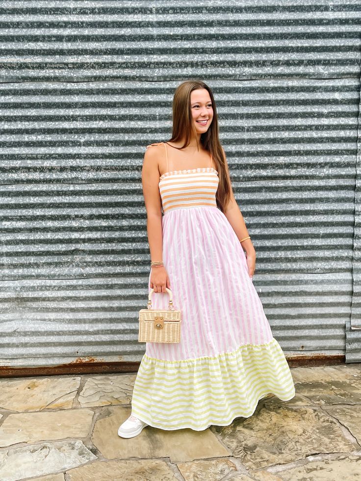 colorful mixed stripe maxi dress with adjustable straps true to size, model is wearing a small Striped Maxi Dress With Vertical Stripes For The Beach, Striped Maxi Dress For The Beach, Striped Summer Maxi Dress For Day Out, Summer Striped Maxi Dress For Day Out, Chic Maxi Dress With Vertical Stripes For Vacation, Spring Vertical Striped Maxi Dress, Spring Dresses With Vertical Stripes In Multicolor, Spring Multicolor Striped Dresses, Pink Vertical Stripe Summer Dress