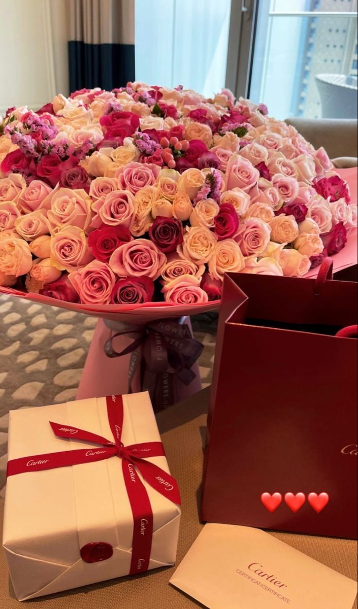 a large bouquet of roses in a gift box