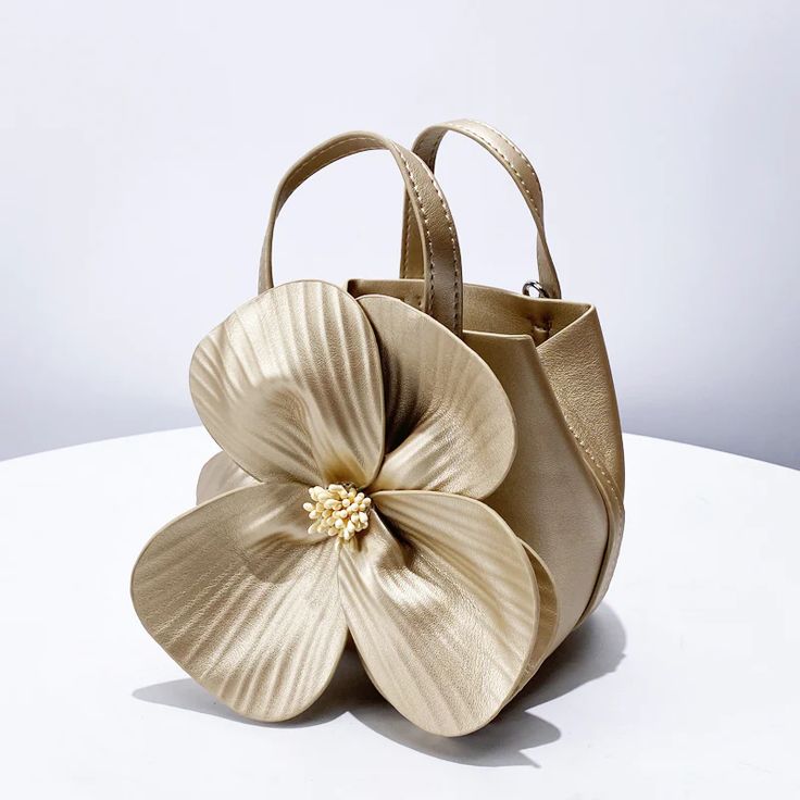 this is a beautiful faux leather bag with a stunning 3D flower front. She comes with satin inner bag and long shoulder chain. New In Fashion, Floral Handbags, Floral Clutches, Flower Bucket, Petal Flower, Faux Leather Bag, Luxury Designer Handbags, Evening Handbag, Evening Purse