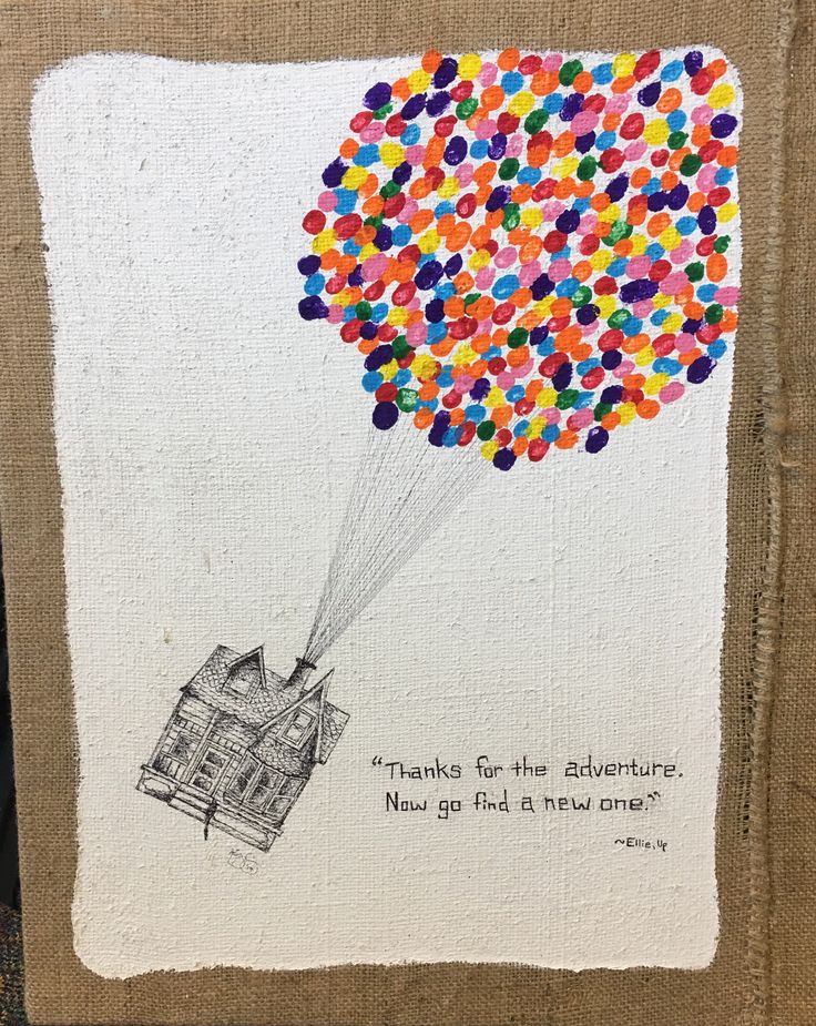 a card with a drawing of a house and balloons in the shape of a balloon