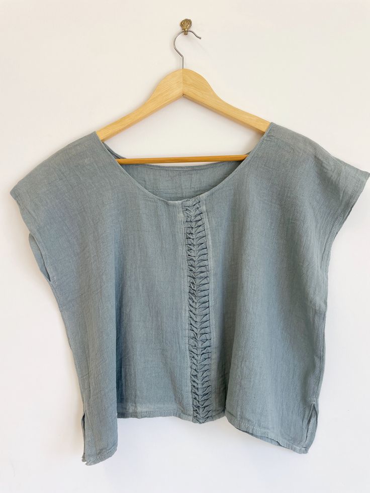 You can't really do summer without a comfortable, versatile cotton crop top that's perfect to throw on for a quick trip to town. This casual cotton crop top, handmade in Oaxaca with natural dyes, is just what you need! Soft natural tones in a variety of colors offer a unique addition to your summer beach vibe. Handcrafted by skilled artisans using traditional techniques, each crop top is made with care and attention to detail. The soft, lightweight cotton fabric and loose, relaxed design make th Summer Cropped Linen Tops, Summer Cropped Crop Top Relaxed Fit, Summer Relaxed Fit Crop Top, Relaxed Fit Short Sleeve Crop Top For Beach, Relaxed Fit Summer Crop Top, Relaxed Fit Cropped Tops For The Beach, Summer Crop Top With Relaxed Fit, Relaxed Fit Cropped Tops For Vacation, Relaxed Fit Cropped Crop Top For Beach