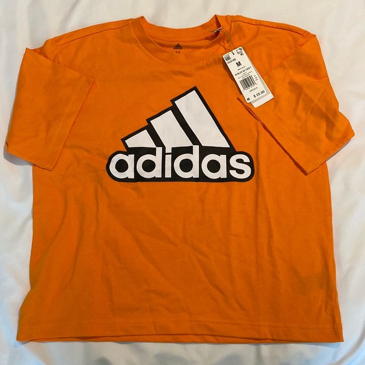 Nwt Orange Adidas Crop Top Adidas T-shirt For Spring Streetwear, Spring Sports T-shirt With Graphic Print, Adidas Three Stripes T-shirt For Spring, Casual T-shirt With Three Stripes Branding For Spring, Spring Adidas Logo Relaxed Fit Tops, Spring Adidas Logo Top With Relaxed Fit, Spring Logo Crew Neck T-shirt, Spring Crew Neck T-shirt With Logo, Spring Logo T-shirt With Crew Neck