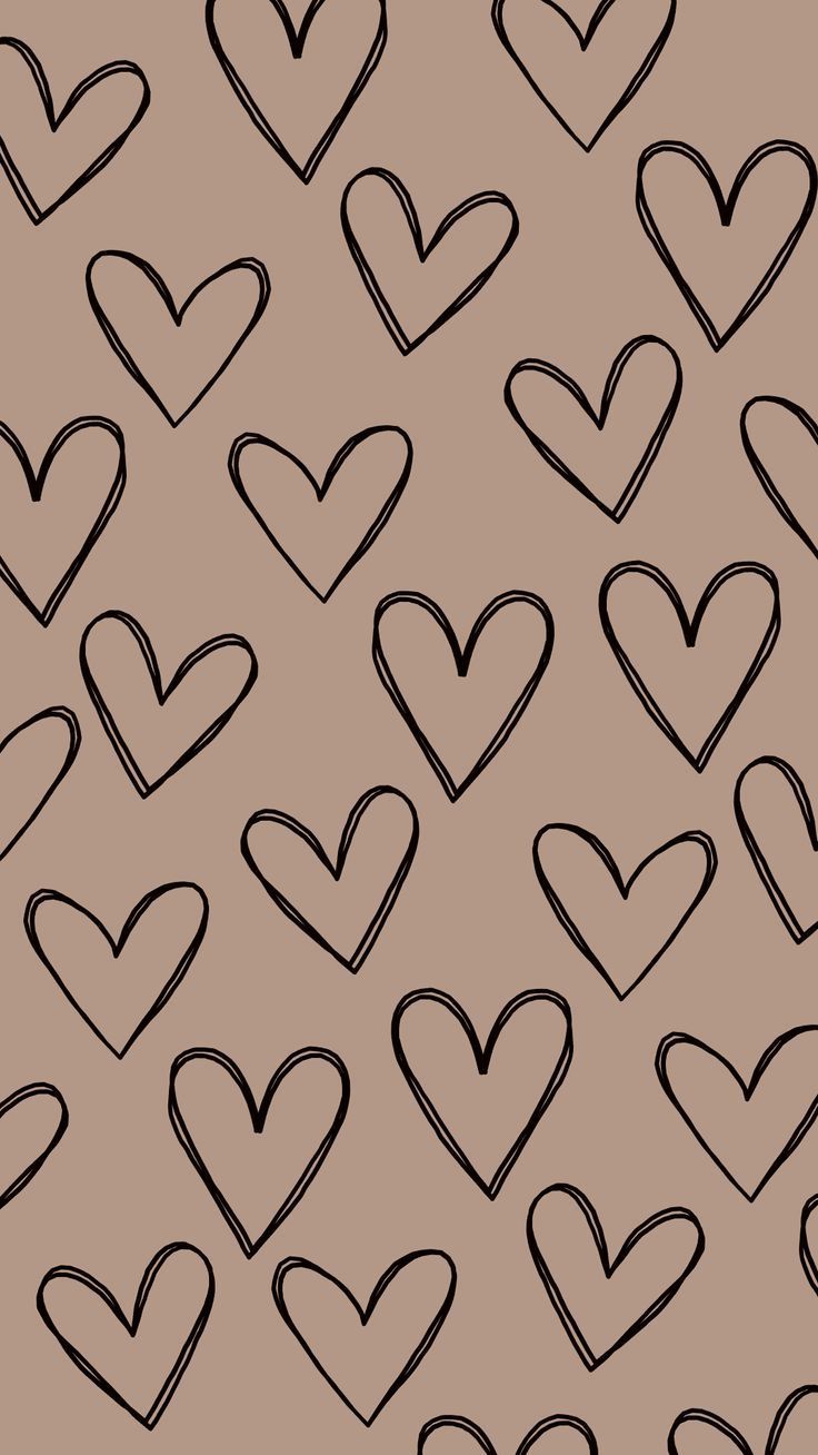 black and brown hearts are arranged in the shape of heart shapes on a pink background