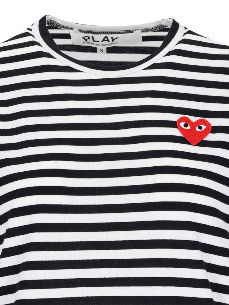 Comme des Garcons Play logo tshirt in white cotton with contrast striped pattern, Uneck, red logo patch on the chest, ribbed trims, straight hem. composition: 100% cotton size and fit: regular fit White Cotton Tops With Logo Patch, White Casual Tops With Signature Stripes, Red Cotton Tops With Signature Stripes, Casual Red Top With Signature Stripes, Striped Crew Neck Top With Logo Print, Chloe Purses, Comme Des Garcons Play, Red Logo, Pleats Please Issey Miyake