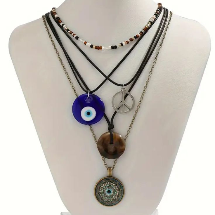 Bohemian Style Beads Crystal Eye Heart Pendant Mix & Match Necklace Set Jewelry Super Cute Boho Necklace Set. Wear Together Or Mix And Match As Desired. See Photo(S) For Measurements. Color In Photos May Not Be An Accurate Respresentation Of Actual Color Due To Lighting. About Me: I Accept Reasonable Offers Next Business Day Shipping New Items Posted Daily Smoke Free Home Hippie Accessories Jewellery, Crystals Jewelry Aesthetic, Bohemian Heart-shaped Adjustable Beaded Necklaces, Heart-shaped Bohemian Beads For Gifts, Bohemian Heart-shaped Beads For Gifts, Bohemian Heart-shaped Gift Beads, Bohemian Heart Beads For Gifts, Brown Bohemian Heart Necklaces, Brown Heart-shaped Bohemian Necklace