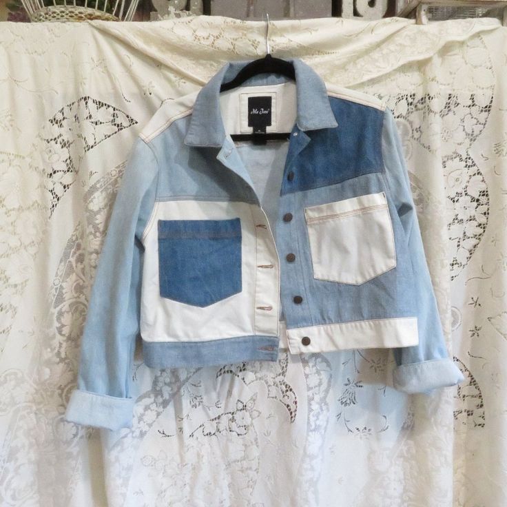 I Have Many Items Listed For Sale This Week! Be Sure To View My Other Items! Up For Sale Today Is A Gorgeous Denim Jacket By Me Jane. It Is A Size Extra Large And Looks To Have Never Been Worn. The Fabric Feels Like All Cotton. It Has No Damage Or Foul Odor. Approx Measurements Are Below. Bust: 36" Upstretched Sleeves : 21" Rolled Length: 21" Thank You, Poshmark Buyers, For Your Support! Fitted Denim Blue Cotton Cropped Jacket, Fitted Blue Cropped Cotton Jacket, Fitted Blue Cotton Cropped Jacket, White Cropped Denim Outerwear, Oversized Blue Patchwork Denim Jacket, Blue Cotton Denim Jacket With Patch Pockets, Blue Relaxed Fit Patchwork Outerwear, Collared Light Wash Cotton Outerwear, Light Wash Collared Cotton Outerwear