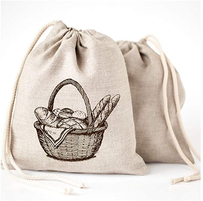 a drawsack bag with an image of bread in the basket on it's side