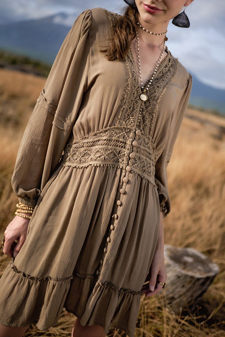 Our boho mini dress lovers will fall instantly in love with the Maribelle Dress. Perfectly relaxed styling meets bohemian luxe in this effortless new silhouette. Pop on with our Eagle Boots for timeless style, this is a dress to wear through all the seasons. This Maribelle Dress features: Lavish Lace trims and detail to waist and neckline Relaxed skirt with frill hem for maximum swish Gorgeous detailed blouson sleeve with elastic cuff Covered buttons Crafted from the softest high quality rayon c