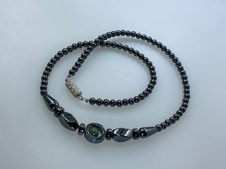 "Vintage 18\" Necklace With Green And Hematite Beads Used" Hematite Black Beads For Jewelry Making, Round Hematite Gemstone Beads Jewelry, Hematite Round Beads For Jewelry Making, Adjustable Hematite Necklace With Black Beads, Silver Hematite Necklace With 8mm Beads, Hematite Necklace With Black Beads As Gift, Gift Hematite Necklace With Black Beads, Hematite Beaded Necklaces With Round Beads For Gifts, Hematite Beaded Necklaces As Gift