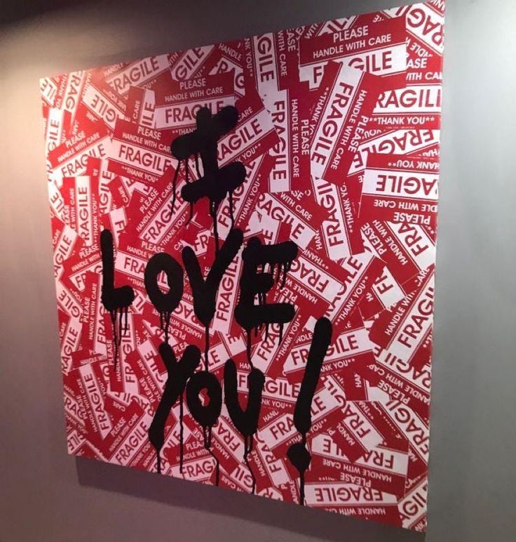 a red and white painting with the words love you on it