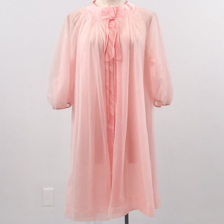 Elegant Vtg Airy Short Nightgown Robe. Soft Flowing Pink Fabric & Multiple Layers, Gathered 3/4 Long Sleeves. Bow & Snap Closure At Top. Vintage Fair Condition - Small Picks & 2 Small Holes That Get Lost In The Layers P6-9. Beautiful & Unique. Cotton Candy Halloween Costume? As-Is 1 Only. Tagless. Model 4. Fits Os. Buy M! Flat~ 17 Sl 35 L Relax Everyday Quarantine Leisure Romantic Sexy Lingerie Intimates Girly Luxury Gathered Ruffle Soft Vintage Hostess 60s Airy Sheer Peignoir Angelic Vintage Pink Nightgown For Spring, Vintage Pink Sleepwear, Retro Pink Sleepwear For Spring, Vintage Pink Sleep Dresses, Pink Vintage Sleep Dress, Vintage Sheer Pink Nightgown, Vintage Pink Sheer Nightgown, Pink Sheer Vintage Nightgown, Vintage Sheer Sleepwear