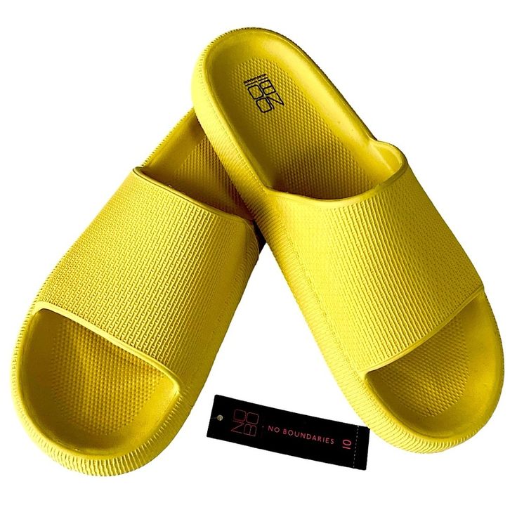 No Boundaries Pillow Soft Slide On Open Toe Cloud Sandals. Non-Slip. New With Tags. Size 10. Color Yellow. Lightweight & Waterproof. Thick Underfoot Cushioning With Anti-Slip Sole. Platform Sole. A Single Broad Strap Hugs The Foot For A Snug Fit. Helps Relieve Pressure And Tension. Easy To Clean. The Durable Wave-Shaped Non-Slip Eva Outsole Is Waterproof And Non-Slip, Providing A Good Grip For Your Feet Without Slipping. This Casual Style Is Suitable For All Seasons As Home Slippers, Bathroom Shower, Swimming Pool, Beach, Spa, Leisure, Public Shower, Steam Room, Dormitory, Camping, Hotel, Locker Room, Or Just Walking Around. Packaged With Care, Ship Same Day/Next Day Except Sun, Offers Welco Shower Steam Room, Public Shower, Cloud Sandals, Beach Spa, Home Slippers, Slide On, House Slippers, Good Grips, No Boundaries