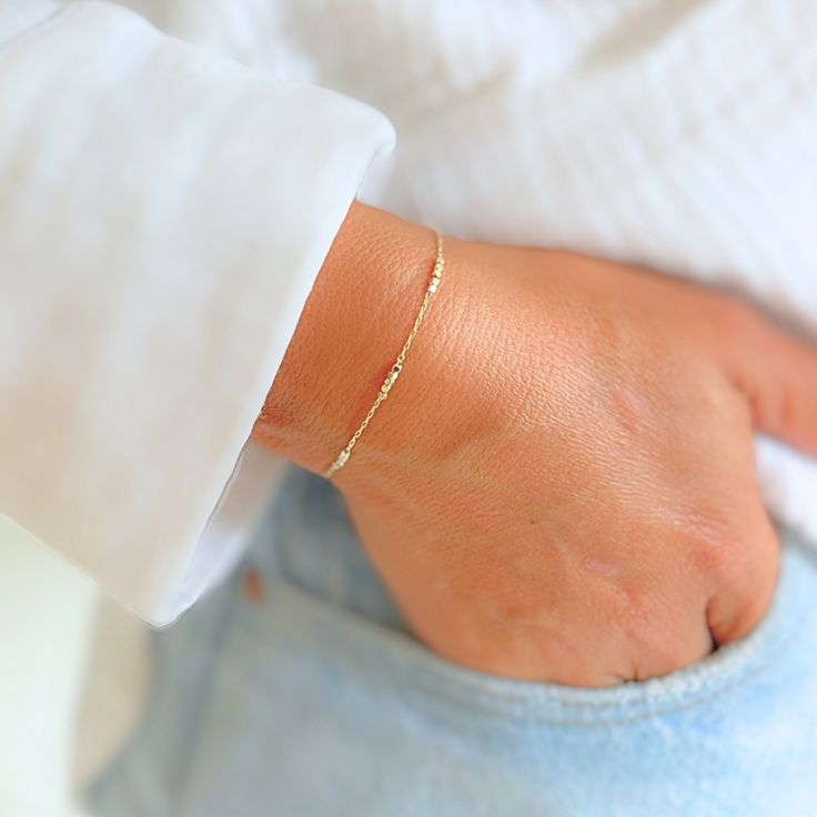 Gold Dainty Bracelet - Wynwood Shop Adjustable Minimalist 14k Gold Filled Charm Bracelet, Dainty Everyday Beaded Bangle Bracelets, Dainty Beaded Bangle Bracelets For Everyday, Dainty Stackable Bracelets For Everyday, Dainty Everyday Stackable Bracelets, Minimalist Stackable Bracelets For Friendship, Trendy Rose Gold Bracelet With Delicate Chain, Minimalist Stackable Bracelets For Everyday, Minimalist Hypoallergenic 14k Gold-filled Bracelets