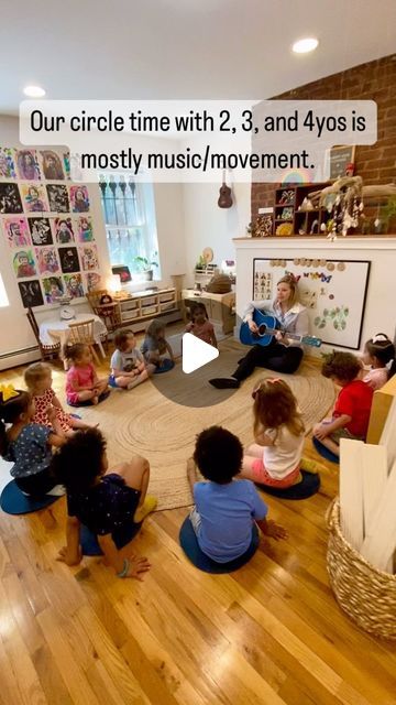 a group of children sitting on the floor in front of a whiteboard with text reading our circle time with 2, 3 and 4yros is most music / movement