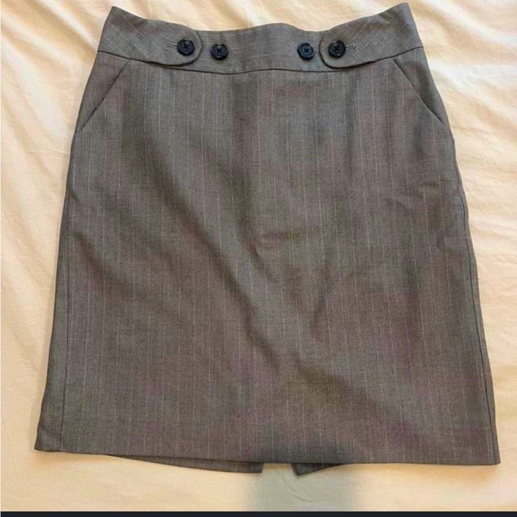 Super Adorable Banana Republic Double Button Pencil Skirt In A Beautiful Suited Gray. Never Worn! Nwot - Make Me An Offer! Workwear Mini Skirt With Side Buttons, Buttoned Pencil Mini Skirt For Work, Pencil Mini Skirt With Buttons For Workwear, Buttoned Pencil Skirt For Office, Office Pencil Skirt With Buttons, Office Skirt With Buttons, Mini Skirt With Side Buttons For Work, Office Mini Skirt With Button Closure, Fitted Workwear Skirt With Button Zip Fly