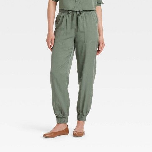 Women's High-Rise Joggers - Universal Thread™ Olive Green S Versatile Viscose Bottoms For Spring, Solid Viscose Bottoms With Elastic Waistband, Solid Color Viscose Bottoms With Elastic Waistband, Versatile Relaxed Fit Viscose Bottoms, Relaxed Fit Viscose Bottoms, Spring Viscose Bottoms For Daywear, Relaxed Fit High-waisted Viscose Pants, High-waisted Relaxed Fit Viscose Pants, Versatile Relaxed Fit Viscose Pants