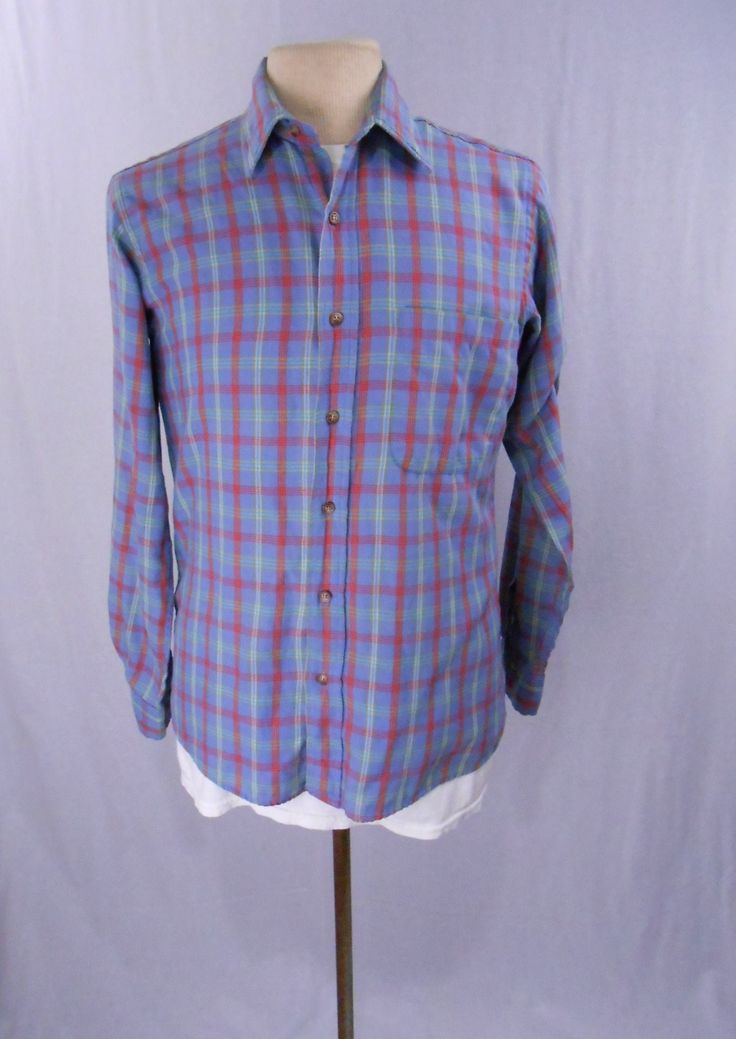 "Vintage 1970's shirt by Sport Rally. Pattern is plaid. Colors are blue, red, green and white. Made of cotton and polyester. Long sleeve. Button down. Single pocket on left side of chest. Has pilling/fuzzies on the collar and a hole above the cuff. Please look at the last 2 pictures. Please note that vintage clothing comes with wear and tear. I do my best to try and make any flaws with a garment known to customers. I want you to know what you are buying before it is purchased. Says it is a size 90s Flannel, 80s Skirt, 80s Shirts, 90s Shirts, Green And White, I Want You, Shirt Sleeves, Vintage Clothing, Want You