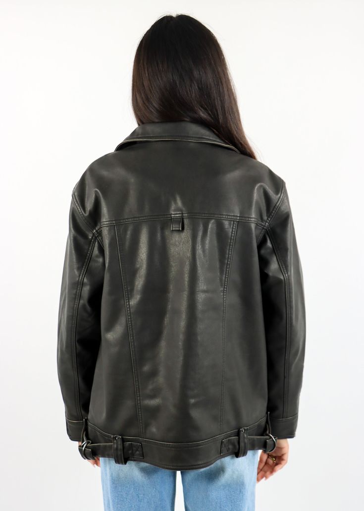 We are loving this Free People Buckle-Up Vegan Leather Jacket in Black. This statement piece features buckle details that elevate its classic, sleek silhouette, making it a must-have for those who love bold yet versatile styles. The vegan leather material offers a chic, cruelty-free alternative, while the structured fit brings just the right amount of attitude. Layer it over anything from dresses to jeans for a look that stands out. The Details Buckle Detail Vegan Leather Structured Fit Black Co Going Out Skirts, Mini Skirt Dress, Bodycon Dresses Casual, Sweat Joggers, Vegan Leather Jacket, Corset Crop Top, Flare Leg Jeans, Leather Jacket Black, Sweater Sale