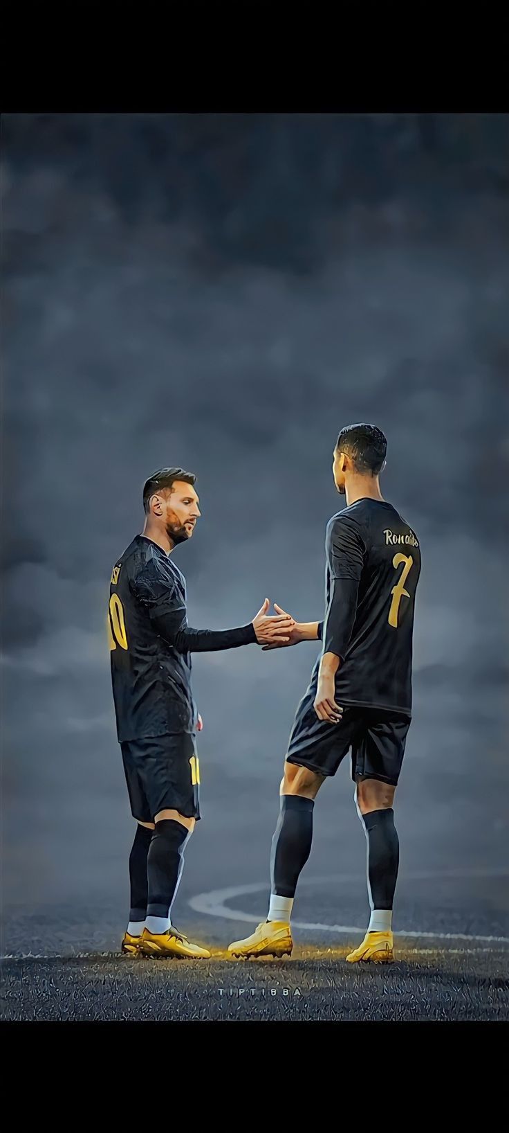 two soccer players are shaking hands on the field