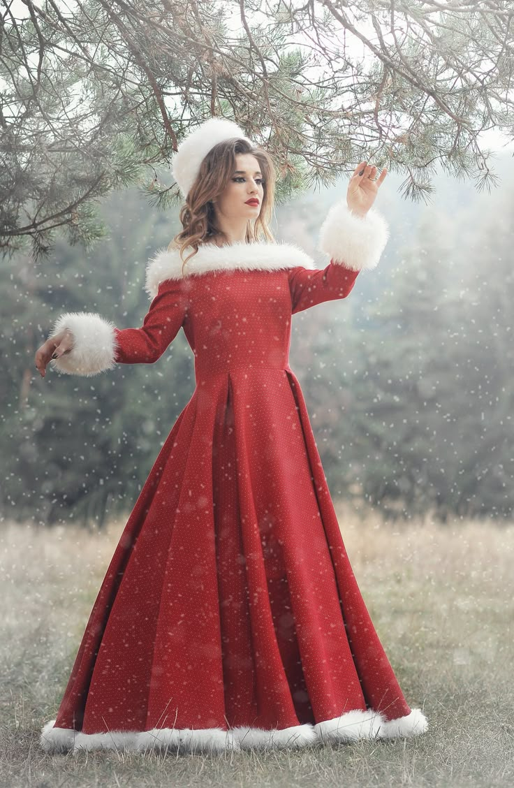 This Mrs Claus dress is made of brocarde fabric with small silver dots. The neckline and trim lines are outlined by white fake fur. The dress comes with an under skirt petticoat with crinoline The dress closes in the back with a zipper. This outfit will make you an outstanding, looking Lady Claus. This is custom-made to clients measurements and I require 2 weeks to finish it. Please contact me for further assistance to discuss measurements and how to purchase a made to order outfit. I will be ha Vintage Christmas Dress Women, Traditional Christmas Outfits, Christmas Fashion Outfits 2023, Christmas Dress White, Mrs Clause Costume For Women, Red Satin Christmas Dress, Modern Mrs Claus Outfit, Ms Clause Outfit, Santa Claus Outfit Woman