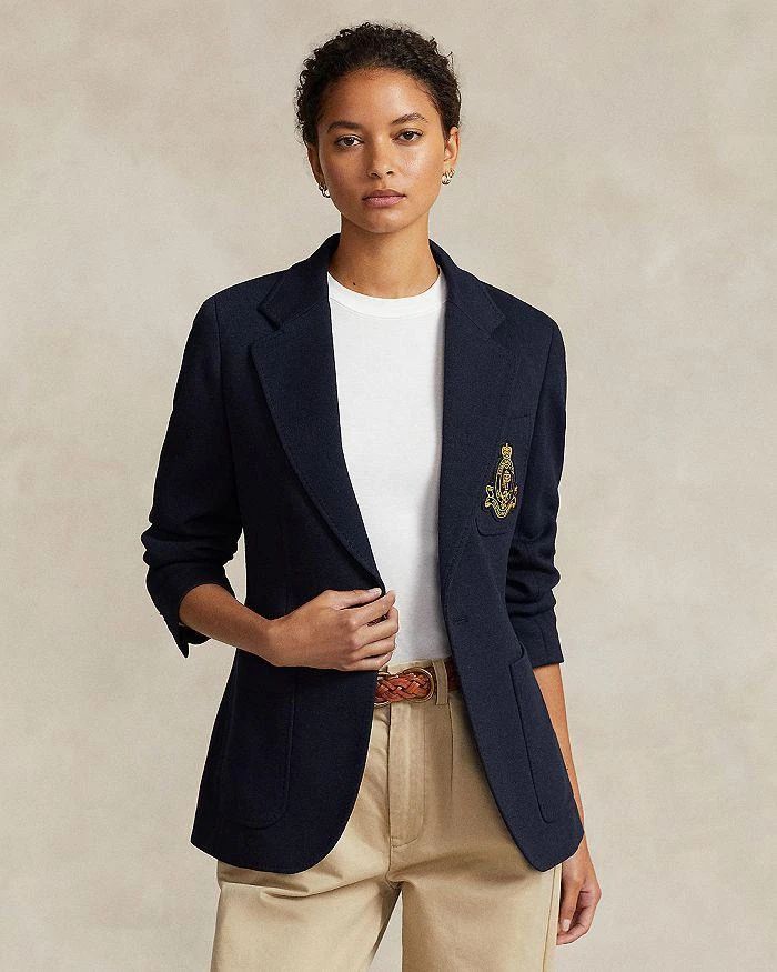 This modern blazer stands out with embellishing details while maintaining timeless style. Featuring a notched lapel, button front closure and long sleeves with buttoned cuffs, it offers versatile layering. An embroidered crest at the chest pocket along with hip and chest patch pockets add fashion-forward flair. Lined in luxurious fabrics, this piece moves effortlessly from day to night. Crafted from a soft blend, it feels as polished as it looks. With its back vent and adaptability for all occas Luxury Long Sleeve Blazer With Pockets, Luxury Blazer With Patch Pockets For Work, Ralph Lauren Long Sleeve Outerwear With Welt Pockets, Ralph Lauren Outerwear With Lapel Collar And Welt Pockets, Ralph Lauren Outerwear With Welt Pockets And Lapel Collar, Fitted Ralph Lauren Outerwear With Welt Pockets, Ralph Lauren Single-breasted Long Sleeve Blazer, Luxury Button-up Blazer With Pockets, Casual Ralph Lauren Blazer With Notch Lapel