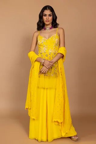 Shop for Varun Bahl Yellow Georgette Embroidered Peplum Jumpsuit With Dupatta for Women Online at Aza Fashions Yellow Chikankari Embroidered Sharara For Reception, Yellow Chikankari Embroidery Sharara For Reception, Yellow Anarkali Set With Chikankari Embroidery For Reception, Yellow Embroidered Palazzo Set For Party, Yellow Embellished Designer Wear Sets, Designer Yellow Embellished Sets, Yellow Georgette Palazzo Set With Mirror Work, Embellished Yellow Sets For Diwali, Embellished Yellow Set For Diwali