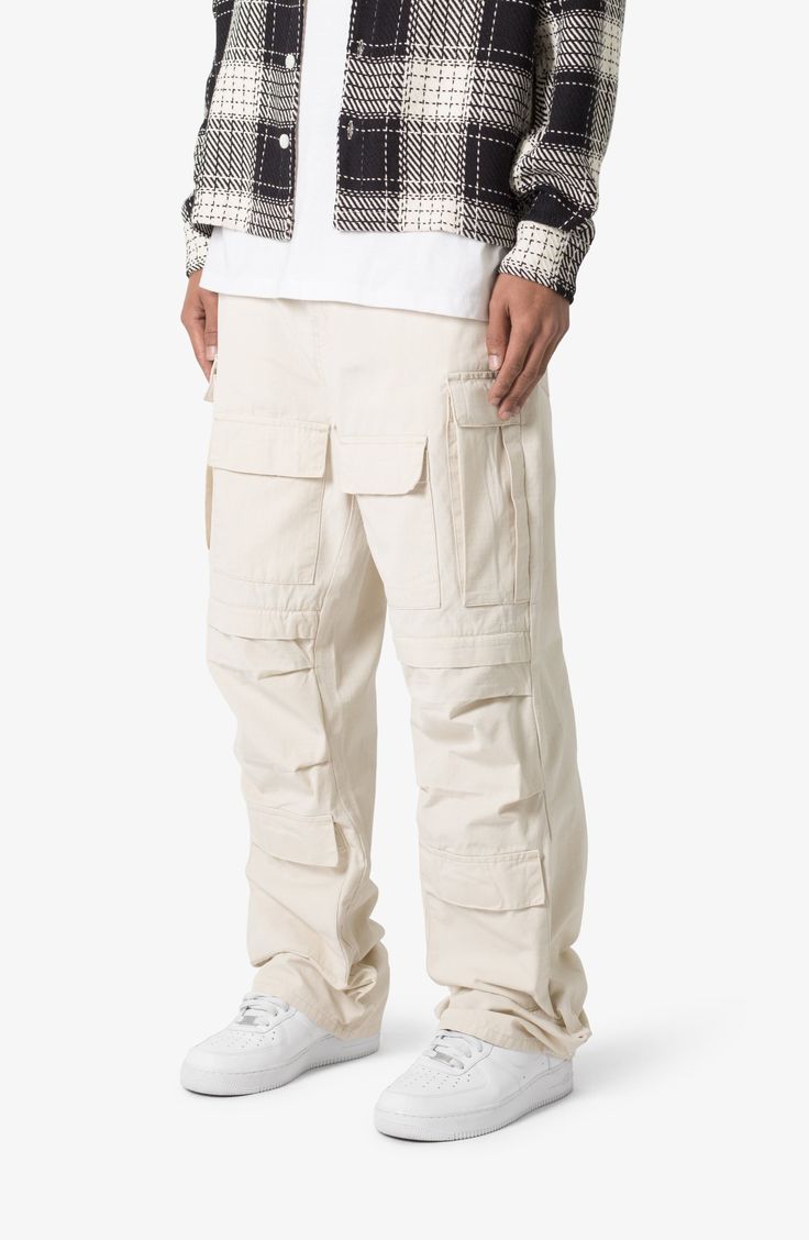 The ultrabaggy fit of these nonstretch cotton pants lets you move with ease all day long, while the cargo pockets keep all your essentials close at hand. 32 1/2" inseam; 9 1/2" leg opening Zip fly with button closure Front scoop pockets; cargo flap-patch pockets; back patch pockets 100% cotton Machine wash, tumble dry Imported Cargo Pants Outfit Men, Pants Outfit Men, Cotton Cargo Pants, Baggy Cargo Pants, Cargo Pants Outfit, Ripstop Fabric, Cotton Pants, Baggy Fits, Cargo Pants