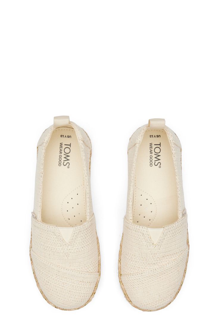 An espadrille-inspired shoe with metallic accents on the rope midsole adds a glint of light to their every step. Removable insole Textile upper and lining/rubber sole Imported TOMS gives a minimum of one-third of its annual net profits to support grassroots efforts, partnering with organizations that boost mental health, increase access to opportunity and end gun violence TOMS is a Certified B Corporation, which meets standards for verified social and environmental performance, public transparen Natural Textile Espadrilles With Round Toe, Textile Espadrilles With Rubber Sole, Round Toe, Textile Closed Toe Espadrilles With Textured Sole, Natural Espadrilles With Cushioned Footbed And Round Toe, Textile Espadrilles With Branded Insole And Round Toe, Natural Synthetic Round Toe Espadrilles, Baby Gear Essentials, Perfume Gift Sets, Perfume Gift