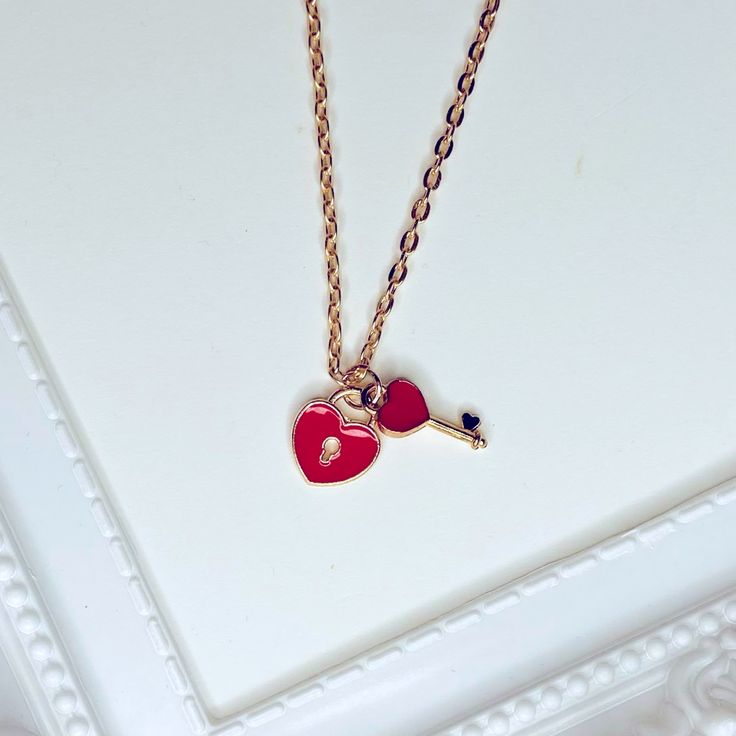 Brand New Handmade Rose Gold Tone Heart Lock And Key Double Charms / Pendants Necklace 0.5in X 0.4in Red Enamel Heart Lock 0.6in X 0.25in Red Enamel Heart Key (Available In Blue Or Black Enamel. See Separate Listings) 18 Inch Rose Gold Plated Chain Bundle & Save! Heart Charm Necklace For Her For Valentine's Day, Heart Charm Necklace For Her On Valentine's Day, Rose Gold Heart Beads Necklace For Valentine's Day, Valentine's Day Rose Gold Necklaces With Charms, Heart-shaped Charm Necklace For Valentine's Day, Pink Charm Necklaces For Anniversary On Valentine's Day, Pink Charm Necklace For Anniversary On Valentine's Day, Valentine's Day Gift Charm Necklace With Lobster Clasp, Double Heart Rose Gold Necklace With Charms