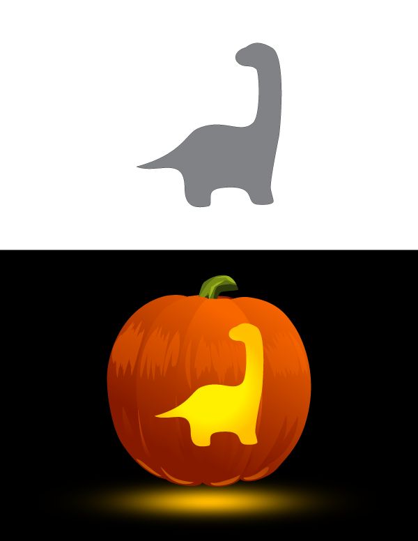 an orange pumpkin with a dinosaur on it and the letter t in the shape of a leaf