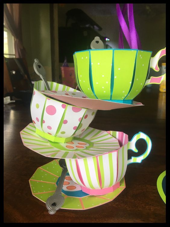 three cups and saucers stacked on top of each other