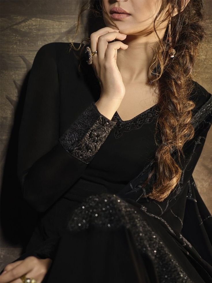 Jennifer Winget black designer gown suit online which is crafted from georgette fabric with exclusive stone, resham work. This stunning designer gown suit comes with santoon inner and georgette dupatta. Embroidered Abaya, Jennifer Black, Anarkali Tops, Black Anarkali, Georgette Gown, Designer Anarkali Suits, Gown Suit, Embroidered Anarkali, Abaya Style