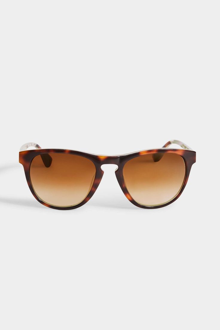 These Elie Tahari Round Acetate Sunglasses, are 100% UV protected & are ideal for sunny days. Designed with a playful green accent lining, these slightly oversized, scratch-resistant sunglasses are a summer must-have. A hard case & cleaning cloth are included.Style#: EL221 Classic Cat Eye Sunglasses With Tinted Lenses For Vacation, Casual Brown Shield Sunglasses With Polarized Lenses, Casual Brown Wayfarer Sunglasses, Classic Sunglasses With Gradient Lenses For Vacation, Beach Sunglasses With Brown Gradient Lenses, Wayfarer Shield Sunglasses With Tinted Lenses, Classic Cat Eye Sunglasses With Mirrored Lenses For Vacation, Brown Sunglasses With Gradient Lenses For Beach, Brown Gradient Sunglasses For The Beach