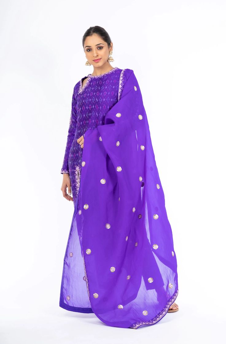 Opulent Pigment Violet Ikkat Raw Silk Handloom Salwar Kameez – Panache Haute Couture Purple Silk Kurta For Party, Purple Art Silk Kurta With Zari Work, Purple Silk Kurta With Gota Work, Festive Purple Salwar Kameez With Zari Work, Festive Purple Palazzo Set, Purple Zari Work Straight Kurta, Traditional Purple Chanderi Kurta, Silk Salwar Kameez With Gota Work In Purple, Purple Raw Silk Kurta For Eid