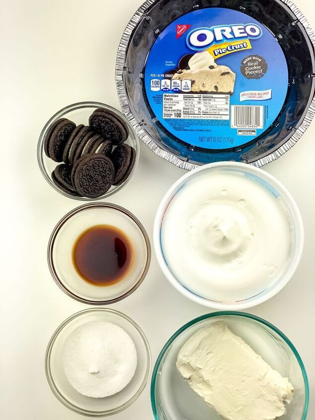 ingredients to make oreo ice cream displayed in bowls