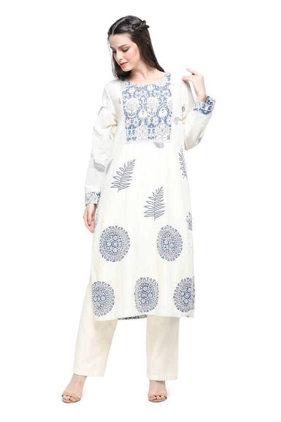 White and blue full sleeves A-line kurta in handloom cotton base with frond bloom print and pintucked printed yoke. Paired with a plain straight pant and ombre printed border dupatta. - Aza Fashions Indigo Kurta With Chikankari Embroidery And Long Sleeves, Long Sleeve Cotton Salwar Kameez With Floral Print, Indigo Kurta With Floral Embroidery And Long Sleeves, Indigo Long Sleeve Kurta With Floral Embroidery, Cotton Anarkali Kurta With Long Sleeves, Cotton Salwar Kameez With Resham Embroidery And Long Sleeves, Long Sleeve Mulmul Salwar Kameez, White Cotton Salwar Kameez With Long Sleeves, Bohemian Cotton Salwar Kameez With Long Sleeves