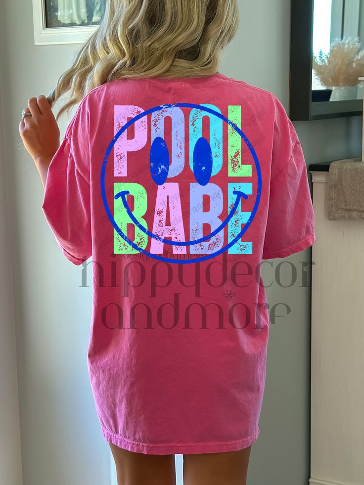 Fun Pink Top With Sublimation Print, Fun Pink Tops With Sublimation Print, Cute Multicolor T-shirt For Vacation, Cute Pink Beach T-shirt, Cute Pink T-shirt For Beach Season, Multicolor Short Sleeve Tops For Poolside, Fun Pink Top For Beach Season, Fun Pink Tops For Beach Season, Playful Tops With Sublimation Print For Summer