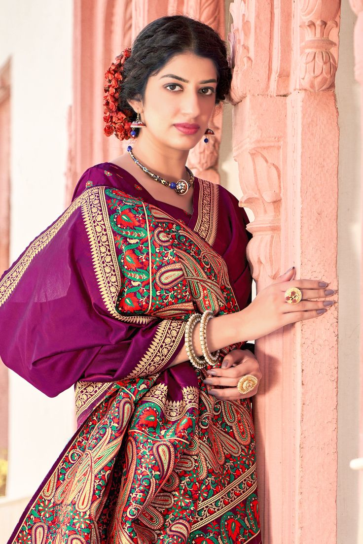 This Saree is Ready to Wear (With Fall and Pico Done). A designer saree in Purple Color. It has intricate design all over the saree. This saree is a suitable amalgamation of style and grace that is required from an ethnic wear. The saree is ideal for any formal gathering. The saree comes with an unstitched blouse of corresponding color and design as shown in the picture. Banarasi Silk Designer Purple Color Saree Fabric Type: Soft Banarasi SilkPrimary Colour: PurpleSecondary Colour(s): Golden Sar Bollywood Style Jamawar Pre-draped Saree For Diwali, Bollywood Style Jamawar Pre-draped Saree For Puja, Embroidered Paithani Silk Saree, Jamawar Blouse Piece For Puja, Paithani Silk Sharara For Eid, Purple Bollywood Saree With Unstitched Blouse, Bollywood Style Purple Saree With Unstitched Blouse, Bollywood Banarasi Silk Saree For Navratri, Navratri Bollywood Banarasi Silk Saree