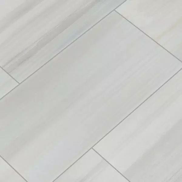 a white porcelain tile floor that looks like wood