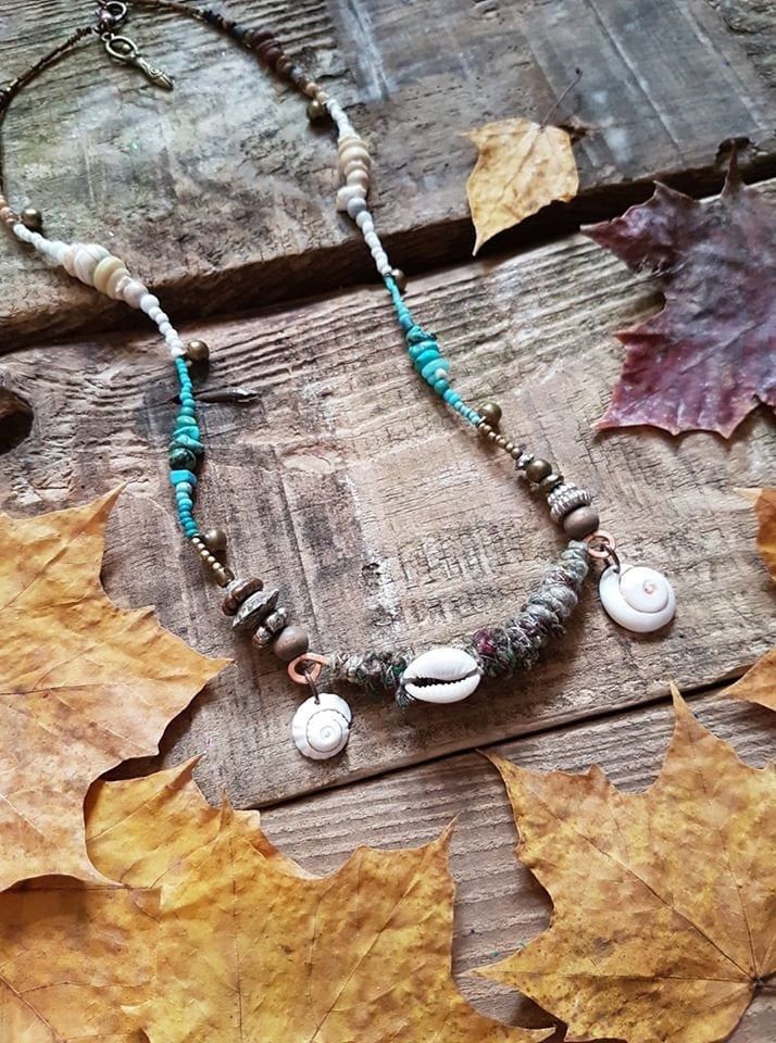 A unique and gorgeous bohemian necklace with beautiful energy, each one is a one of a kind piece. I hand craft each piece of my artisan jewellery with Love, from mostly recycled materials. This one has a gorgeous fiber pendant hand crafted with recycled materials and tinkly bells, with natural beads, tiny indian bells, seed pods, spiral shells, and crystals. You will get the same necklace shown in the photos * Instagram: https://www.instagram.com/lea_and_elfie/ * Find Lea's page on facebook here Bohemian Necklaces For Jewelry Making, Handmade Hippie Necklaces For Meditation, Artisan Beaded Necklace With Gemstone Beads For Beach, Bohemian Hand Wrapped Beaded Necklaces For Festivals, Bohemian Beaded Necklaces For Festival, Bohemian Adjustable Beaded Necklaces, Adjustable Bohemian Beaded Necklaces, Hippie Style Festival Necklaces, Hippie Gemstone Beaded Necklaces For Beach