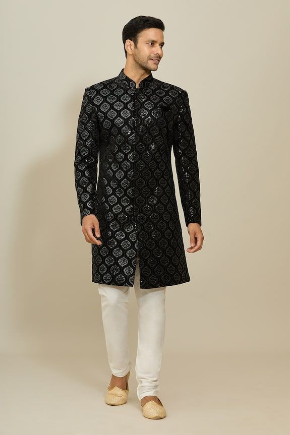 Black sherwani with all over Mughal ogee pattern, thread and sequin embroidery. Paired with a white churidar. - Aza Fashions Black Sherwani, White Churidar, Embroidered Sherwani, Ogee Pattern, Sequin Embroidery, Cocktail Reception, Sequins Embroidery, Churidar, Mandarin Collar