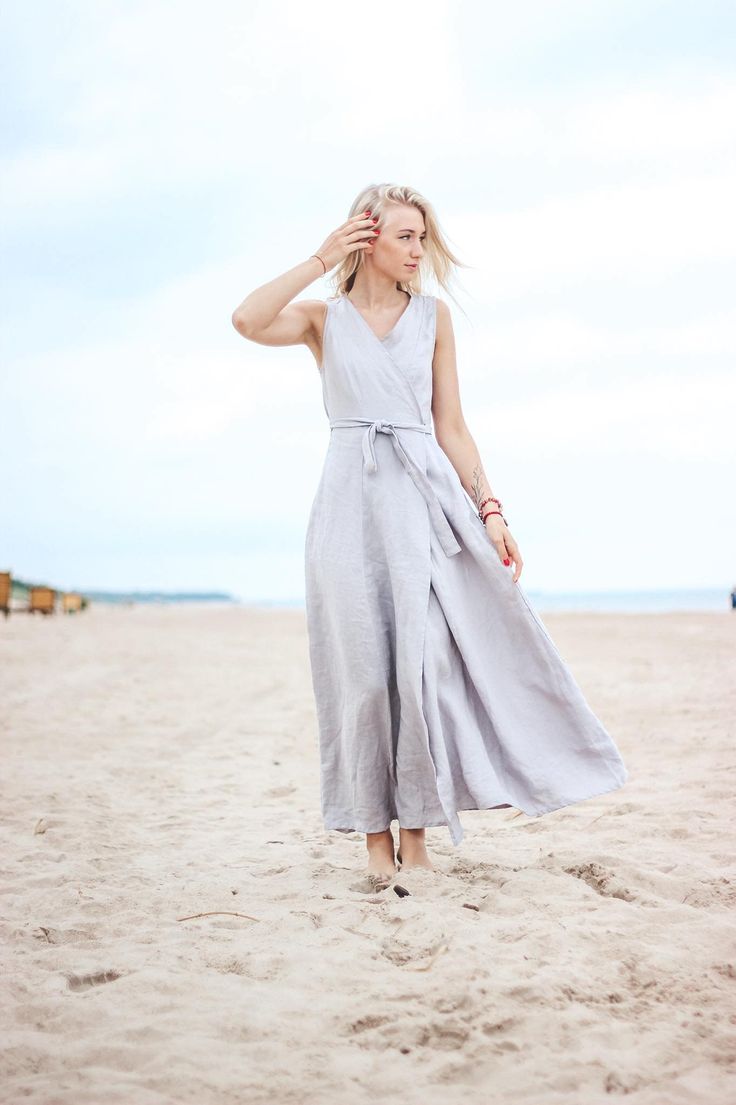 "Stunning long V-neck wrap natural linen dress! Very comfortable universal dress. Details * weight: 205 g/m² or 6.05 oz/yd² * 100% natural Baltic linen * softened * breathable, anti-allergic * light, very durable and strong * easy to wash * suitable for children * OEKO-TEX® Standard 100 certified (guarantees you that it meets ecological requirements) Model wears size S, 172 cm/5'7\" tall. GARMENTS ARE DESIGNED FOR 164-176 CM HEIGHT ( 5'5\"-5'9\") PLEASE LEAVE A NOTE WITH YOUR ORDER, IF YOUR HEIG Linen Maxi Dress With Tie Waist, Beach Linen V-neck Dress With Tie Waist, Linen Belted V-neck Midi Dress, Belted Linen V-neck Midi Dress, Belted V-neck Linen Midi Dress, Beach Linen Dress With Tie Waist And V-neck, Beach V-neck Linen Dress With Tie Waist, Linen Dresses Elegant, White Linen Skirt