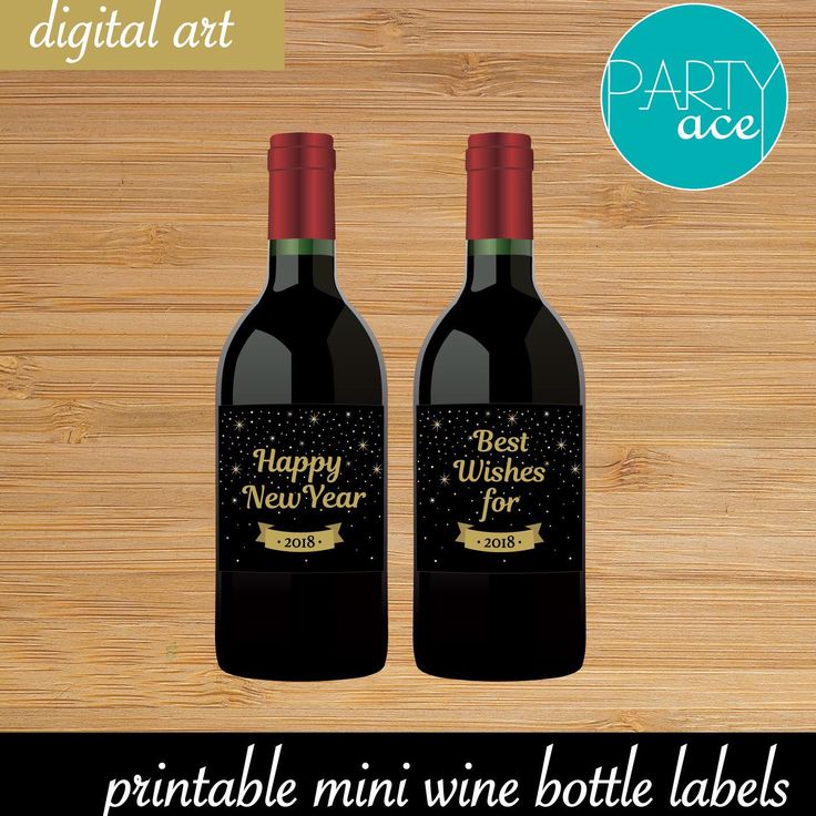 two bottles of wine on a wooden table with the words happy new year printed on them