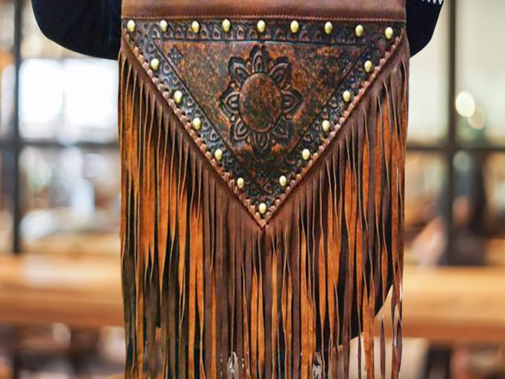 Vintage Leather Bags With Fringe, Traditional Fringe Shoulder Bag For Everyday Use, Bohemian Leather Shoulder Bag With Fringe, Traditional Fringe Bag, Artisan Shoulder Bag With Fringe For Festivals, Artisan Fringe Shoulder Bag For Festival, Artisan Leather Shoulder Bag With Fringe, Artisan Brown Bag With Fringe, Artisan Rectangular Shoulder Bag With Fringe