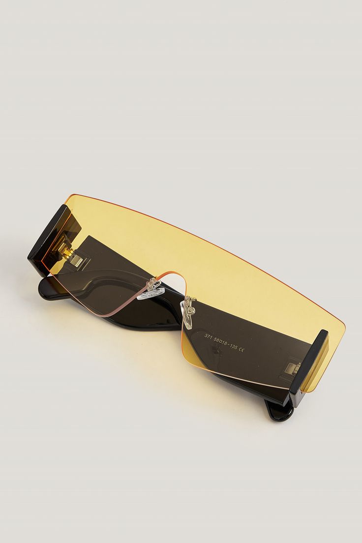 Introducing the Frameless Yellow Lens Sport Sunglasses. These sporty shades feature a frameless design and yellow lenses for a trendy and practical touch. Sport Sunglasses, Make Memories, Sports Sunglasses, Have Fun, Body Types, Cardigans, Lenses, Women's Clothing, Perfect Fit