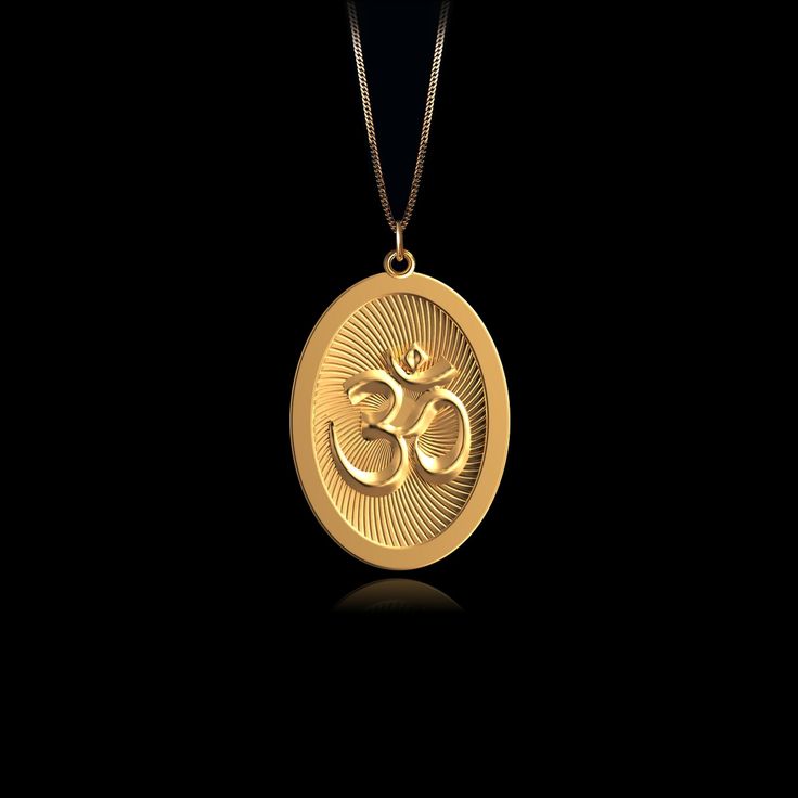 Connect with the sacred sound of the universe with our gold Om pendant, finely crafted in the USA. Representing the essence of ultimate reality, consciousness, and inner peace, each piece is a harmonious blend of spirituality and artistry. PENDANT INFORMATION This pendant is made of real, solid gold.• Made in USA• Material: 14k or 18k solid gold• Finish: polished• Height: 1.25" (31,5 mm) x Width: 0.84" (21 mm)• Pendant weight: approx. 6 grams (14k)• Bail: fits up to 4 mm chains• Solid back, not Spiritual Yellow Gold Brass Jewelry, Spiritual Recycled Gold Round Pendant Jewelry, Spiritual Recycled Gold Pendant Jewelry, Spiritual Yellow Gold Jewelry In Recycled Gold, Spiritual Gold Plated Jewelry With Polished Finish, Spiritual Yellow Gold Jewelry With Polished Finish, Spiritual Yellow Gold Recycled Jewelry, Spiritual Round Recycled Gold Jewelry, Spiritual Jewelry In Recycled Gold