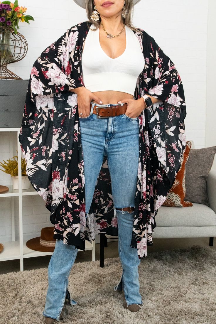 Flutter into fashion with our Floral Butterfly Sleeve Kimono! Featuring a beautiful butterfly print and flowy sleeves, this kimono is the perfect addition to any outfit. Soar with style and embrace your inner free spirit. Chic Wrap Cover-up For Spring, Casual Black V-neck Kimono, Chic Wrap Kimono For Brunch, Casual Black Wrap Kimono, Chic Spring Loungewear Kimono, Casual Black Cover-up For Loungewear, Casual Spring Cover-up With Kimono Sleeves, Casual Spring Wrap Cover-up, Black Summer Kimono With Kimono Sleeves